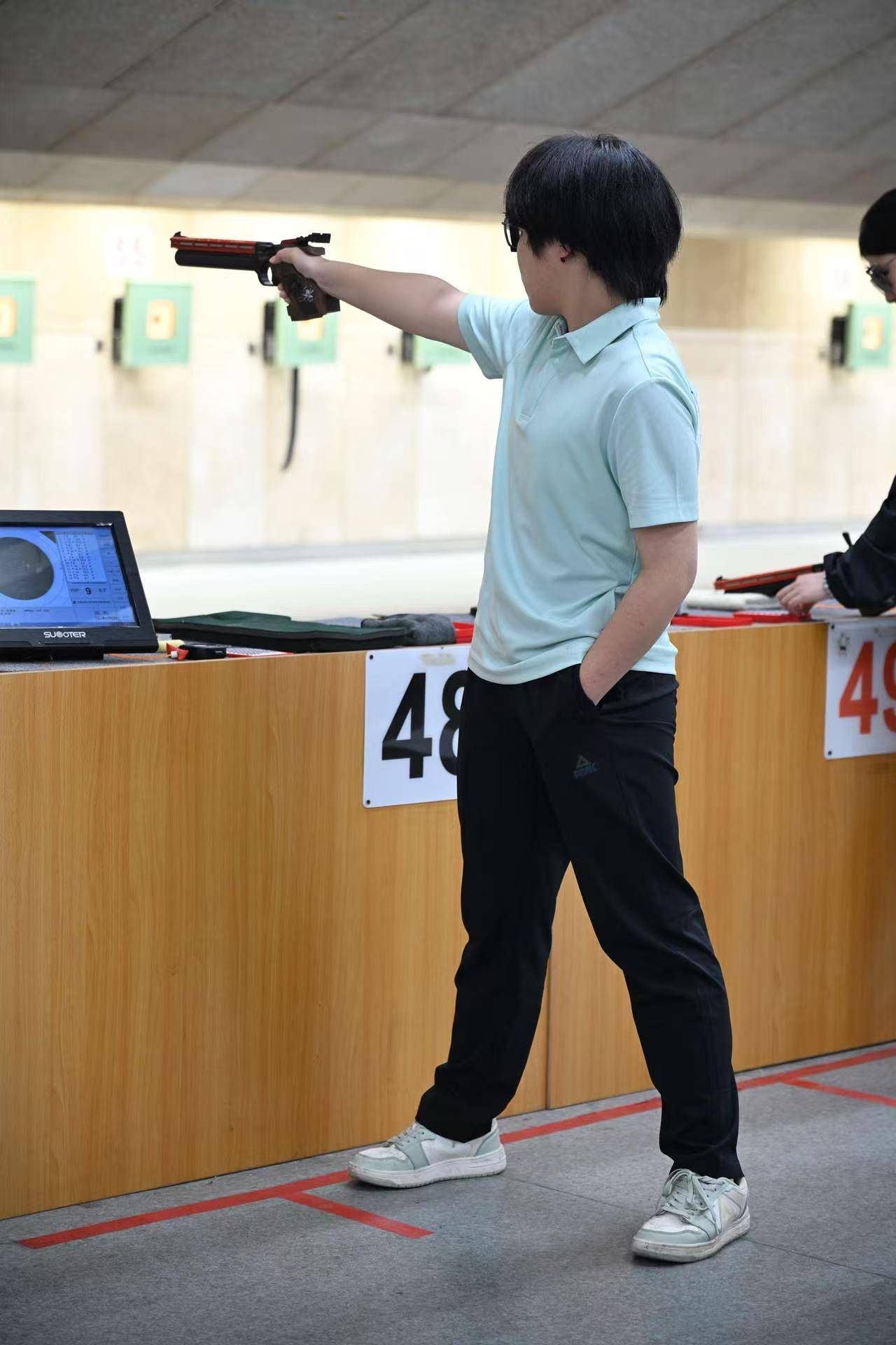 射击男子团体赛，中国队勇夺金牌